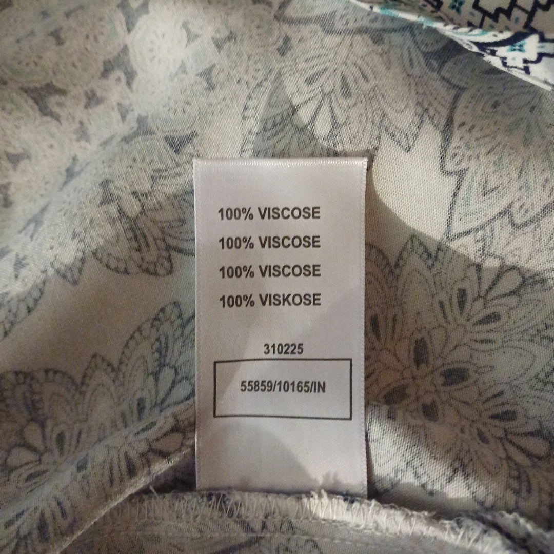 Blouse blanche à motifs, Damart, taille 48