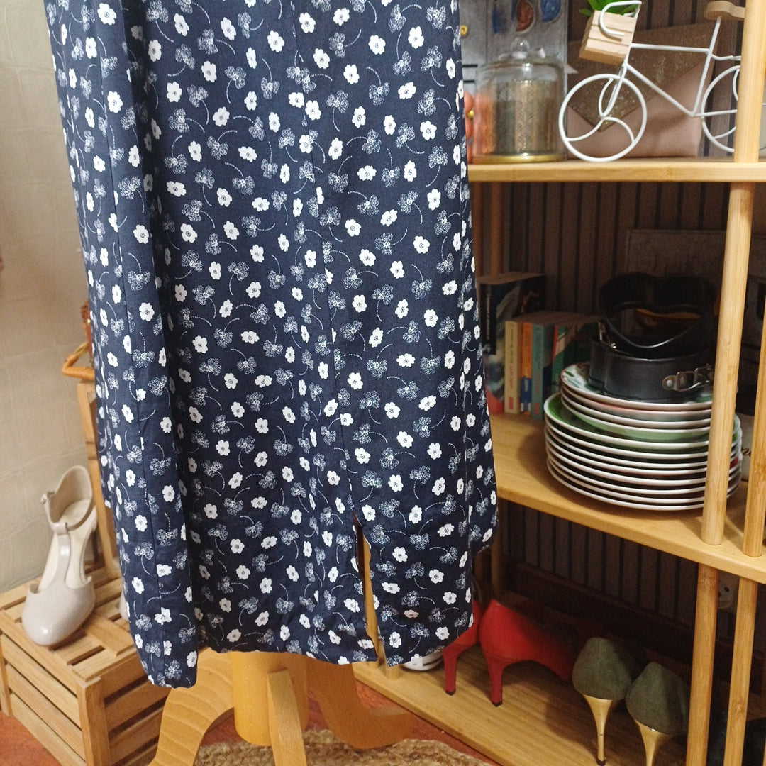 Robe bleue à motifs blancs, taille 54/56
