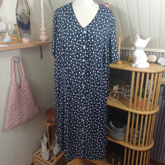 Robe bleue à motifs blancs, taille 54/56